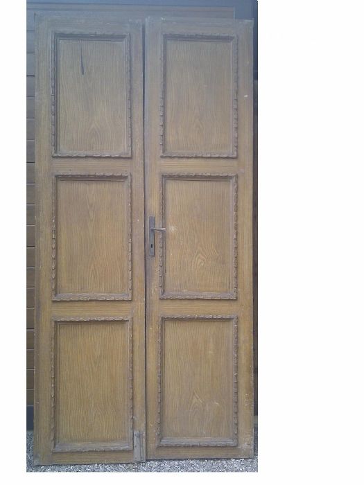 Puerta doble con 3 paneles