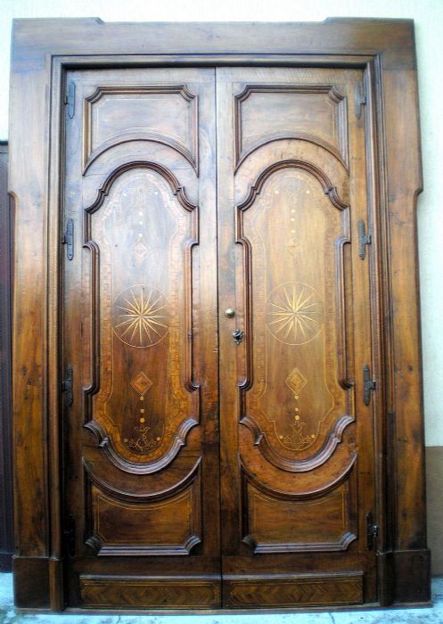 Puerta de 2 hojas con incrustaciones